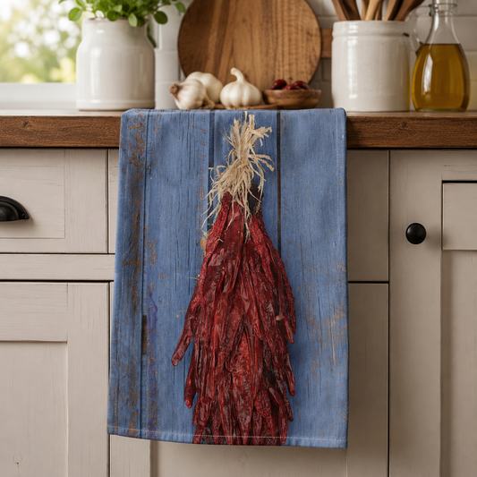 Chili pepper ristra hand towel draped over counter.